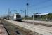 An international freight passes the wayside station at Vilajuiga heading for the border at Port Bou behind RENFE electric loco 253-067. The wagons will be re-gauged at the border to continue on SNCF metals but the loco will return with a southbound freight.  <br><br>[Mark Bartlett 21/09/2015]