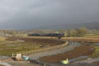 A Leeds to Carlisle service passes the new connection to the Arcow Quarry loading sidings on 23 January 2016. The new track is curving away to the north while the sidings are only a short distance out of shot to the left.<br><br>[John McIntyre 23/01/2016]