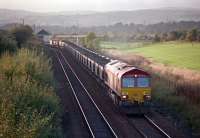 66249, with loaded coal train, passing east at Carmuirs East Junction in 2000.<br><br>[Ewan Crawford //2000]