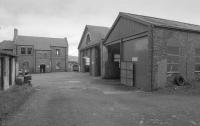 The 3'6' gauge Rothesay Tramway closed in 1936, but the Pointhouse depot survives in commercial use. Looking across the yard with the offices to the left.<br><br>[Bill Roberton /10/1996]