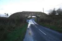 Bridge No 3 on the Fairlie Branch, looking northwest from Templeton Farm, 07 November, 2009, better known to me as the 'Fortacres Bridge',even though Fortacres Farm is the next one south on the B751 Gatehead to Symington road, and to others as 'The bridge to nowhere' (note lack of embankment to the left (west) side of the bridge. Having been built for the opening of the branch on 26 February, 1849 the bridge remains in remarkably good condition despite closure of the branch on 07 April, 1951 (although it is believed that the section of line from Caprington Junction, about half a mile to the northeast, had been out of use for a long time before that date), like Bridge No 2 its care and maintenance being the responsibility of British Railways Residuary and its successors. In fact, the lighter grey patch on the arch ring at the left side of the height/width marker was a very recent repair. Just out of picture to the left was Newfield Mine, which opened in 1940 and closed 1956, its coal being sent (assume by lorry) to Montgomeryfield, near Dreghorn, for washing.<br><br>[Robert Blane 07/11/2009]