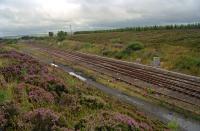 Benhar Junction where the Caledonian's Benhar Branch joined the Shotts line. View looking east in 2000. The Benhar Branch, which ultimately served Polkemmet Colliery, ran off to the left.<br><br>[Ewan Crawford //2000]