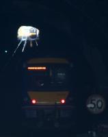 In this photograph, the light at the end of the tunnel really is that of an approaching train but the crossover in the tunnel which is about to put the two ScotRail services safely on separate lines is not visible. The Queen Street High Level Tunnel is due to be closed from 20th March - 8th August 2016 for trackbed replacement work.<br><br>[Colin McDonald 30/01/2016]