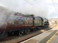 Travelling through Penrith station, at the line speed of 75mph, 46233 <I>Duchess of Sutherland</I> takes the <I>Cumbrian Mountain Express</I> towards Carlisle on 30th January 2016. On the return journey the train traversed the S&C route.<br><br>[Mark Bartlett 30/01/2016]