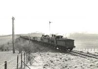 <I>The Twins</I> - ex-Caledonian 0-6-0s 57628 and 57615 - approaching Drongan from Belston Junction on 30 March 1959 with combined trips K28 and K29 from Littlemill Colliery heading for Ayr. [Ref query 25068] <br><br>[G H Robin collection by courtesy of the Mitchell Library, Glasgow 30/03/1959]