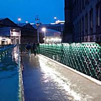 Twilight at Waverley and a strip of LEDs brings out the the lattice on the c1900 footbridge at the Calton Road entrance. The original light fittings add a more token contribution.<br><br>[David Panton 05/02/2016]