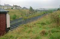 Hurlford signal box (left) looking south in 1988. The Barleith Sidings (Johnny Walker) were laid on the site of the line to Newmilns, Darvel and Hurlford Shed. This box is where the trades unionist Jimmy Knapp started his career.<br><br>[Ewan Crawford //1988]