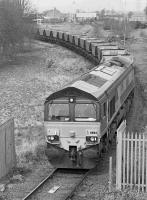 66164 propels empty wagons into the closed Kincardine Power Station yard for loading with opencast coal.<br><br>[Bill Roberton
 13/04/2000]