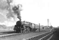 Standard class 5 4-6-0 73079 leaving Prestwick on 6 August 1955 with a Girvan - Glasgow train.<br><br>[G H Robin collection by courtesy of the Mitchell Library, Glasgow 06/08/1955]