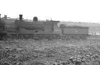 A rubble strewn Rose Grove shed yard on 25 September 1960, with ex-LYR 0-6-0 52445 amongst the residents. The locomotive was withdrawn from here two months later and cut up at Horwich Works in January 1961. Rose Grove itself was officially closed in August 1968. <br><br>[K A Gray 25/09/1960]