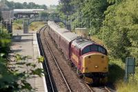 37520 waits for Royal Scotsman passengers to return from a distillery visit before heading south from Tain on 21 July 2000.<br><br>[Bill Roberton
 21/07/2000]