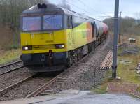 Colas 60056 enters Dalry with the diverted Dalston - Grangemouth empties.  The goods yard was located on the right.<br><br>[Bill Roberton
 09/02/2016]