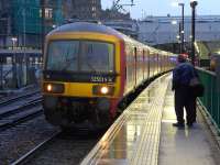 325015 leads a diverted Shieldmuir - Willesden mail train into platform 7 at Waverley for a crew change, on 11 February.<br><br>[Bill Roberton
 11/02/2016]