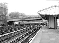 A class 50 with the 0834 Penzance - Paddington about to pass the LT Hammersmith & City Line station at Royal Oak in April 1980, less than half a mile from its destination. <br><br>[John Furnevel 05/04/1980]