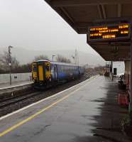 A Stranraer service heads south in the bucketing rain from Girvan.<br><br>[John Yellowlees 16/02/2016]