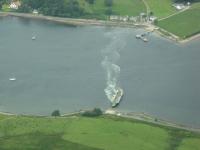 One of Calmac's largest Loch class ferries arrives at Rhubodach after completing the operator's shortest crossing from Colintraive on 6 July 2008. The photograph was taken from an aircraft on the short-lived scheduled Oban to Glasgow seaplane service.<br><br>[Malcolm Chattwood 06/07/2008]