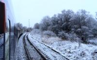 The Lowland sleeper, diverted via Kilmarnock due to repair work on the Lamington viaduct, waits at Lugton on 17th February 2016. <br><br>[Colin McDonald 17/02/2016]