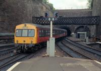 101.360 enters Queen Street in 1989. The apparent tunnel portal to the right was for possible quadrupling of the line which never took place. It's all rather overshadowed by the Buchanan Galleries here now.<br><br>[Ewan Crawford 12/06/1989]