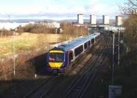 After an effortless climb, 170408 on a Glasgow - Edinburgh service reaches the top of the Cowlairs incline and into the sunlight on 22nd February 2016.<br><br>[Colin McDonald 22/02/2016]