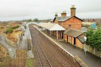 Sunday morning scene at Annan station, unfortunately between trains despite the large number of diversions using the G&SW in January 2016. The broad path on the left gives step free access to the Glasgow platform from Elm Road.<br><br>[Mark Bartlett 31/01/2016]