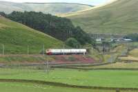 A Virgin Voyager northbound between Crawford and Abington on 10 August 2006. The train is a Birmingham New Street - Glasgow Central service. <br><br>[John Furnevel 10/08/2006]