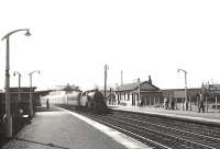 Fairburn tank 42195 arrives at Newton-on-Ayr station on 3 August 1958 with a train for Glasgow.  <br><br>[G H Robin collection by courtesy of the Mitchell Library, Glasgow 03/08/1958]