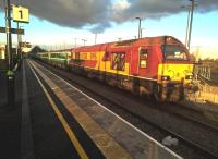 This happened a lot sooner than I expected. Less than 6 weeks after Arena and Bermuda Park [see image 53940] stations opened, London Midland took the initiative to charter 67028, 67006 <I>Royal Sovereign</I>, and a 6-coach Anglia set to work shuttle services between Coventry, Coventry Arena, and Nuneaton (not stopping at Bermuda Park). This train is the 1706 to Coventry. The sporting event was a rugby match between local team Wasps (who won) and the London-based Harlequins.<br><br>[Ken Strachan 28/02/2016]