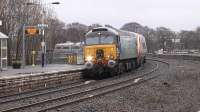 DRS no 57307 drags Pendolino 390006 through Kilmarnock on a very wet and cold Sunday 21 February 2016<br><br>[Ken Browne 21/02/2016]