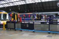 DMUs wait at (L to R) Glasgow Queen Street platforms 2, 3, 4, 5 and 6.<br>
Nos. 2 - 5 will be extended into the present concourse area during the station refurbishment.<br><br>[Colin McDonald 24/02/2016]