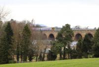 A Borders Railway service crossing Newbattle Viaduct on 29 February 2016, seen from the south side.<br><br>[John Furnevel 29/02/2016]