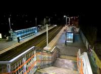 Last man standing - but it doesn't look like an action movie. A BLS member who had just left the 'North Midlands Tracker' railtour awaits his onward connection at Uttoxeter station on 27 February 2016. The footbridge is a fairly recent addition [see image 20924].<br><br>[Ken Strachan 27/02/2016]