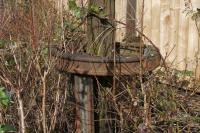 Built to last - this ring of rails protecting one of the yard lamp poles survives in the brambles at the edge of what is now a private car park south of High Street station. [See image 7979]<br><br>[Colin McDonald 05/03/2016]