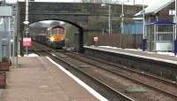 The diverted Carlisle to Mossend engineers wagonload service about to run through New Cumnock station on 18 February 2016 behind GBRf 66737.<br><br>[Ken Browne 18/02/2016]