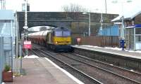 Colas Railfreight no.60056 takes 6S36 the diverted Dalston to Grangemouth empty tanks through New Cumnock on 18 February 2016.<br><br>[Ken Browne 18/02/2016]