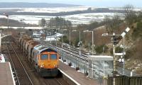 GB Railfreight 66737 <I>Lesia</I> takes 6M49 the diverted Mossend to Carlisle engineers wagonload through New Cumnock on 18 February 2016.<br><br>[Ken Browne 18/02/2016]