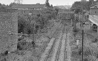 At Whifflet South Junction (in the background) the Gartsherrie North Junction - Coatbridge Central - Whifflet extension of the Garnkirk and Glasgow Railway (with the extension, it was renamed as the Glasgow, Garnkirk and Coatbridge Railway) met the Wishaw and Coltness Railway just south of where it began at Whifflet East Junction where it met the Monkland and Kirkintilloch Railway, seen in the foreground here. The closed RB Tennents works to the left were being demolished in 2001.<br><br>[Bill Roberton //2001]