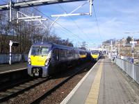 A Dalmuir service pulls out on a fine early spring morning to be followed a few minutes later by the Cumbernauld train on Platform 2. This will leave in the same direction but shortly head northwest at Sighthill East Junction. Platform 3 sees little use these days and Platform 4 apparently none at all.<br><br>[David Panton 05/03/2016]