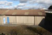 View to Gordon over what had been Earlston station, a two platform station with a goods yard (to the left). Little remains of the station and goods yard, the site now being an industrial estate.<br><br>[Ewan Crawford 06/03/2016]