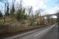 There are two embankments to the north of Leaderfoot Viaduct, the one on the approach to the viaduct and the other to its west (seen on the left). I don't imagine the Berwickshire was planning a triangular junction with the Waverley Route (and two viaducts) and suspect the second embankment is the remains of a siding associated with the construction of the viaduct. This siding, which would have been approached from the Earlston direction, appears to have gone out of use after construction was finished. The formation is still clearly visible.<br><br>[Ewan Crawford 06/03/2016]