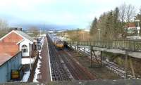 The diverted 4M25 Mossend - Daventry containers running south through New Cumnock on 18 February hauled by DB Schenker 66145.<br><br>[Ken Browne 18/02/2016]