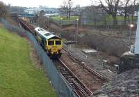 Works have commenced on the Cowlairs Incline out of Glasgow Queen Street.<br><br>
<br><br>
66.520 (and another unidentified 66) with a PW train on the Cowlairs Incline viewed looking south from Keppochhill Road. Some track lifting has already occurred near to the camera.<br><br>[Rod Crawford 20/03/2016]