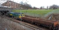 66.520 with a PW train on Cowlairs Incline. Beyond the railway is Sighthill Cemetery, established in 1840 around the time the railway was under construction.<br><br>[Rod Crawford 20/03/2016]