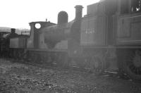 A line of steam locomotives awaiting disposal at Llandudno Junction in April 1963. In the centre is 52119 with 40093 on the right. [Ref query 9307]<br><br>[K A Gray 01/04/1963]