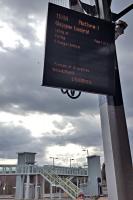 The Perth destination board shows the 15:16 departure for Glasgow Central. The new station footbridge at the south end of the station is in the background.<br><br>[John Yellowlees 21/03/2016]