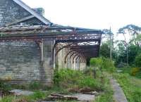 The down platform of Whittingham station, Northumberland, photographed looking south in May 2004. The station, on the Alnwick - Cornhill line, closed to passengers in 1930. [See image 22386]  [Ref Query 4213]<br><br>[John Furnevel 29/05/2004]