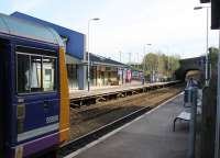 A Manchester Victoria to Blackburn service (via the reinstated Todmorden Curve), calls at Burnley Manchester Road on 14th March 2016. Closed originally in 1961, the station was reopened in 1986 but the new station building was only constructed in 2015. <br><br>[Mark Bartlett 14/03/2016]