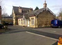 Looking at the attractive former small Midland Railway station of Kibworth on 29 February 2016, from what would have been the station approach. Kibworth closed in 1968 and the platforms have since been removed. The tracks to the right have been fenced off so passing trains can no longer be seen.<br><br>[John McIntyre 29/02/2016]