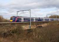 The 1142 from Aberdeen crosses the Clyde at Clydesmill on its way to Glasgow Central on 25th March 2016, during the period of the diversions from Queen Street High level caused by the Cowlairs tunnel works.<br><br>[Colin McDonald 25/03/2016]