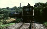 37 296 heads south from Cynheidre with a loaded train. It is seen approaching a crossing within a short distance of Cynheidre.<br><br>[Andrew Saunders //]