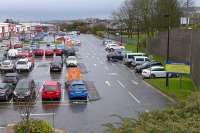 Looking east from Inglis Street over the site of Dunfermline Upper station, now a retail park.  Only the concrete retaining wall remains. 27 March. [See image 50641] for the same view in 1973.<br><br>[Bill Roberton 27/03/2016]